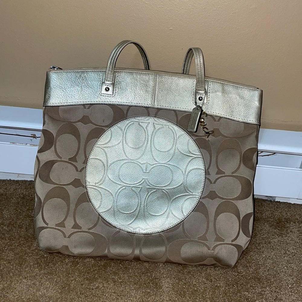 Tan coach bag.